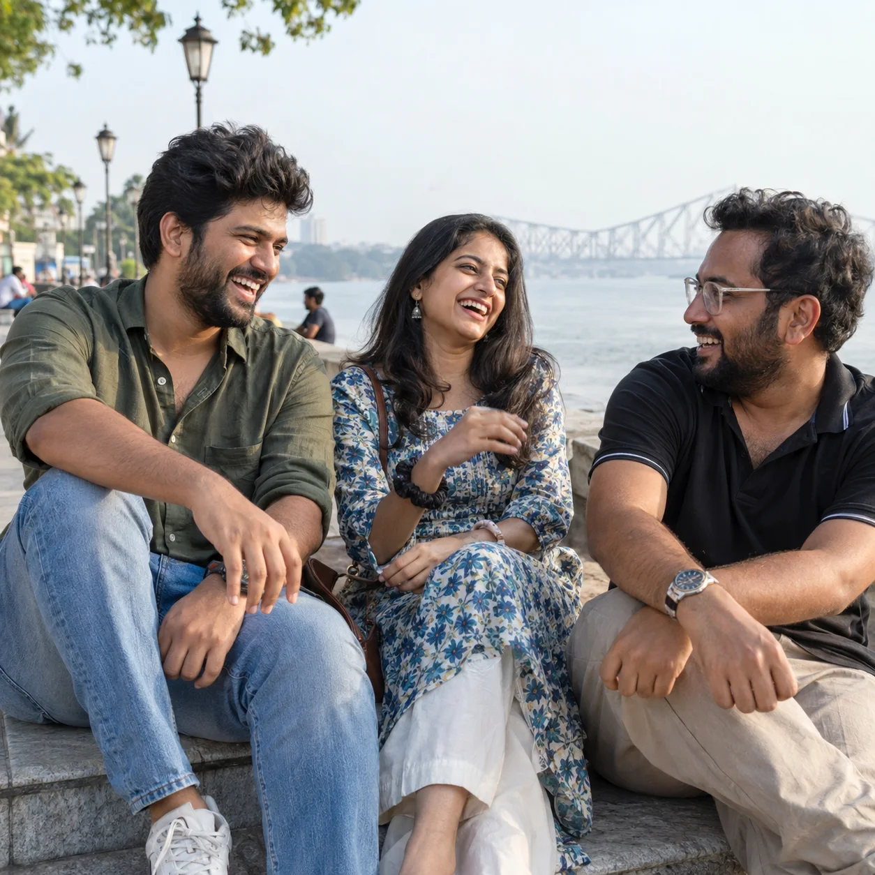 Friends chatting on a riverside promenade